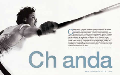 chanda rubin leaning into a backhand shot, tightly cropped from mid thigh, body enters horizontal photo from extreme left and racquet extends to the upper right corner with slight blur to indicate motion in black and white