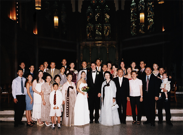 extended families at church wedding in New York